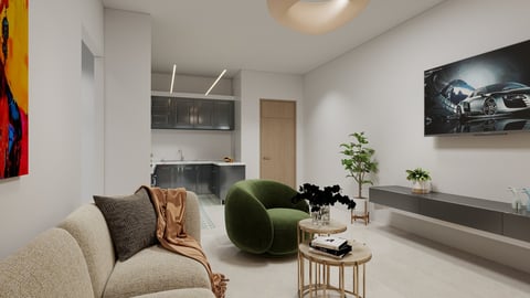 Modern minimalist living room with beige sofa, green armchair, kitchenette, and mounted TV in contemporary apartment